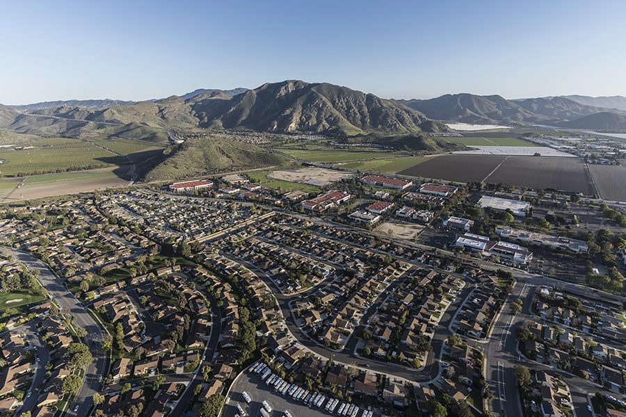 Camarillo, CA - Aerial View of Community in California at Dusk with Mountains in the Distance