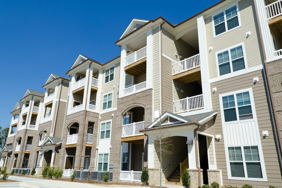 Apartment-Building-Insurance-New apartment building in suburban area